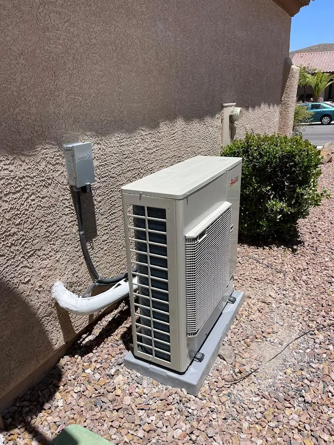 Residential air conditioning condenser unit in Woodward